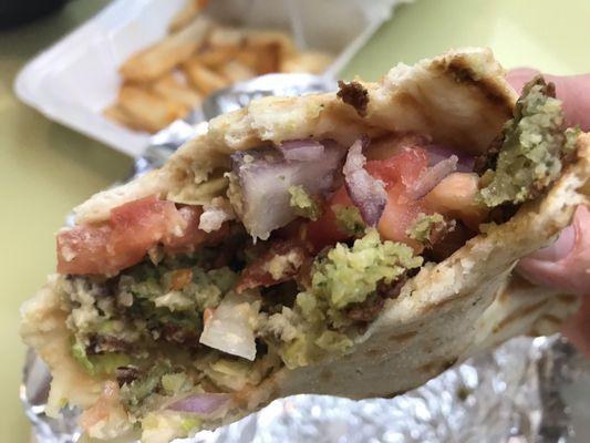 Falafel , purple onion, tomato, hummus and tzatziki sauce