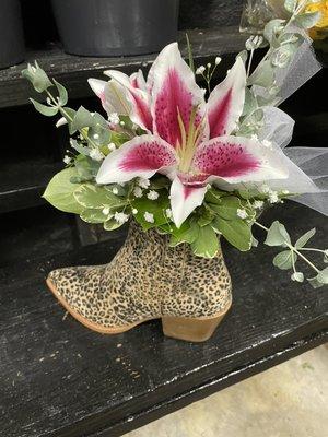 Yes we can. Bring us your special container and we will be more than happy to fill it with flowers.