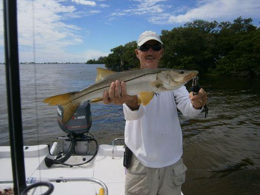Bill with a catch and release Snook