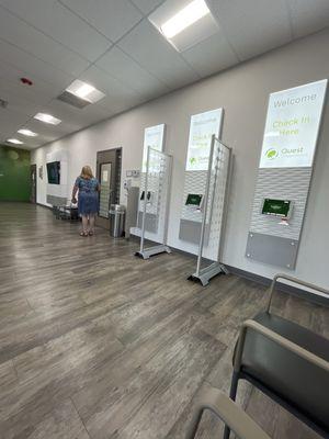 Large, clean waiting room with easy check in kiosk.