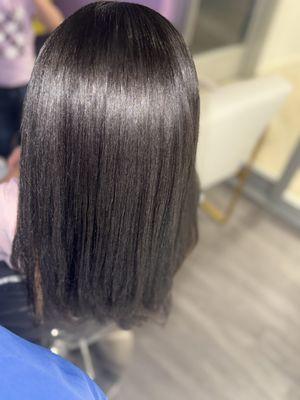 Silk press done by me on super curly hair!