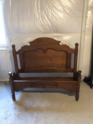 Love seat out of an antique hand made bed frame.