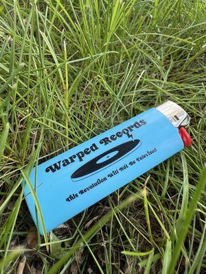 Warped Records Branded Lighter