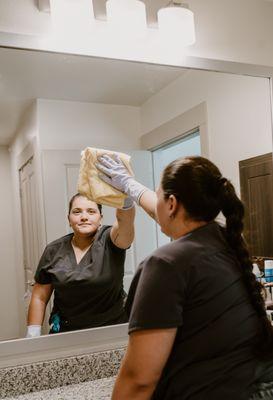 One of our dedicated service pros creating a sparkling bathroom