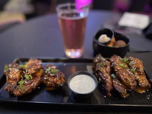 Buffalo wings, seltzer and mini corn bread muffins