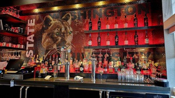 The Hamton Inn has a pretty legit bar!  Decent selection of beers and a good but paired down selection of bottles.