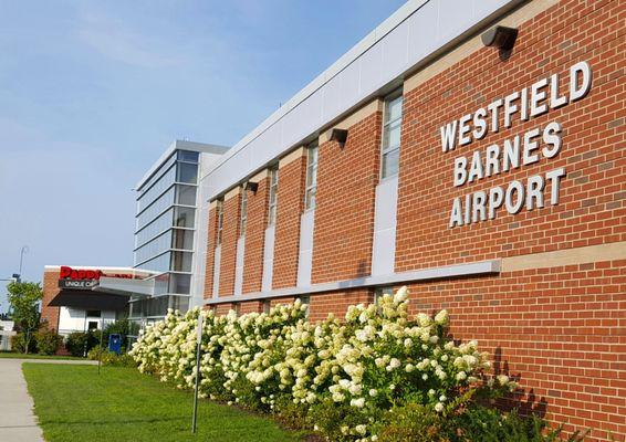 Looking down the front of the main terminal building towards Papps Bar & Grill