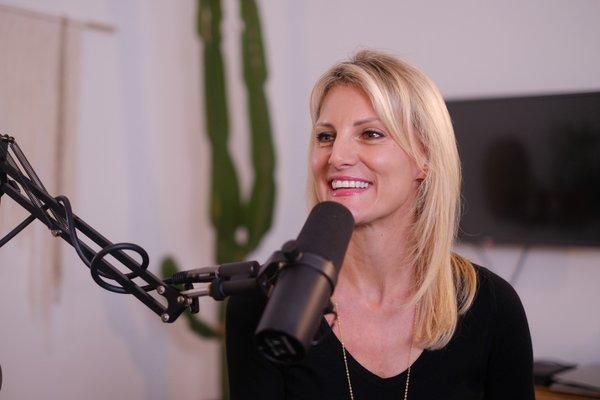 Valerie chatting with a guest on her podcast LipRoll