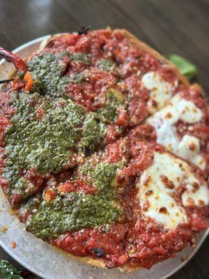 Deep dish , half chop and half pesto chicken