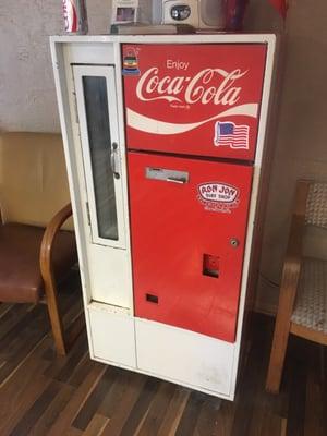 They give a free beer or soda with every haircut