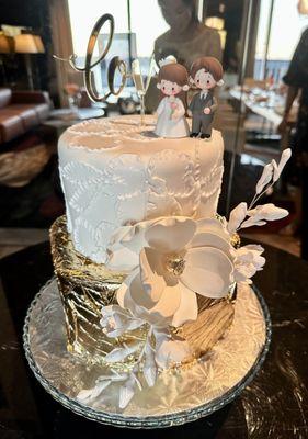 So pretty.  We bought the cake toppers ourselves, but the rest (including the sugar flowers) were all Morfey's