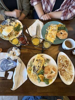 Garlic Parmesan steak omelette with hashbrowns Chilaquiles Omelette with biscuits and gravy Flight of mimosas