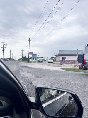 Driving up to the small shop