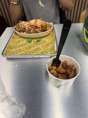 We paid 22$ for this they charged for extra veggies and protein okay fine but that bowl of chicken was like half full like wtf 4$ for that