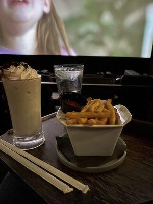 Cookies and cream boozy shake and cold fries all while STILL watching previews