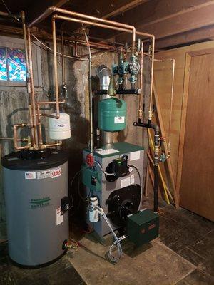Peerless boiler with a peerless 50gal peerless hot water heater. Complete with burner