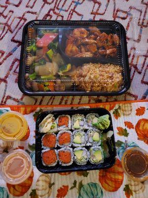 Chicken and shrimp hibachi dinner and 2 sushi rolls, one spicy tuna and the other California roll.