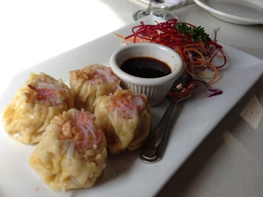 Kanom Jeeb (Thai steamed dumplings) - Filled with shrimp, chicken, crab and vegetables, served with homemade 'special sauce'