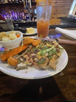 Not happy,service was excellent,food not so much$24 for a 10 ounce ribeye that was thin as paper and full of fat.