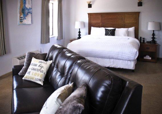 Room at a Glance - King Suite, Custom Artwork, Queen Leather Sleeper Sofa, Luxury Linens by Comphy Brand, Fireplace, Keurig and 52" Smart TV