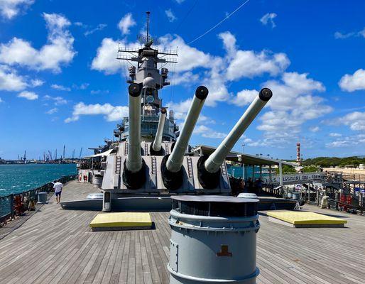 on deck the USS Missouri with its massive 16 inch bore guns, requiring 660 lbs of gunpowder each for one shot