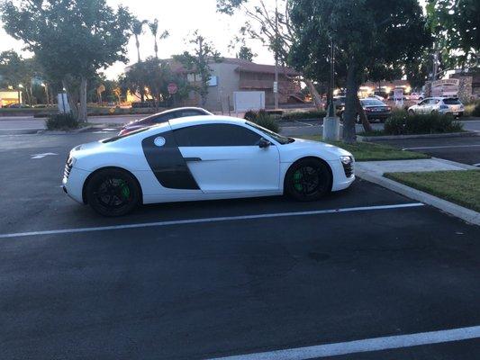 The amazing Audi white r8 with brembo brakes pads. Awesome engine. Audi rings. Audi truth in engineering.
