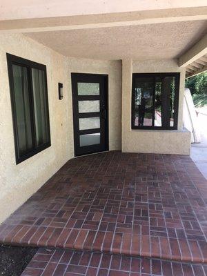 Steel entry door from Urban doors with black Anlin Windows!