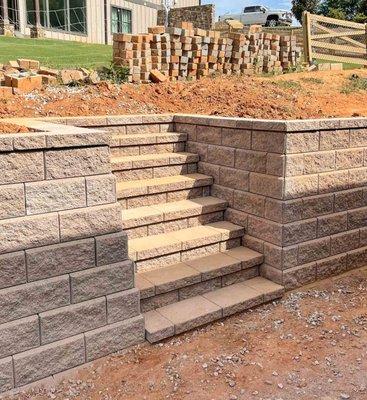 Retaining wall install that makes the slope accessible and stunning