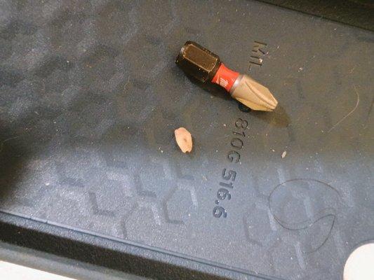 That's is the most recent piece I dug out because it was hurting so bad. I put it next to the drill tip for reference of size