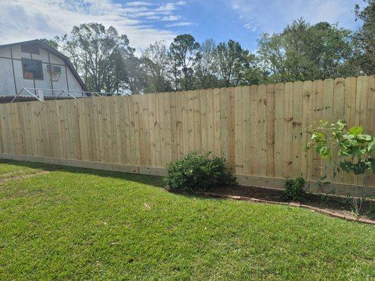 Boards added to the bottom to hide my unlevel ground at no cost.