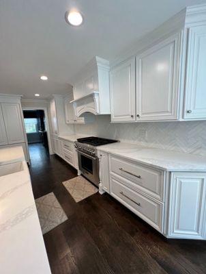 New Countertop  New backsplash  Sprayed existing kitchen cabinets  Looks  Thank you NSP&R