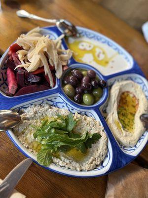 Salatim Platter - tahini, hummus, burnt eggplant, olive oil and pickled radishes, carrots. Comes with pita breads