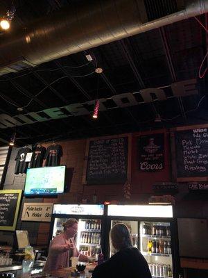 Milestone Bar overhead sign!