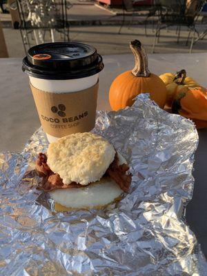 Bacon, egg and cheese biscuit with latte.