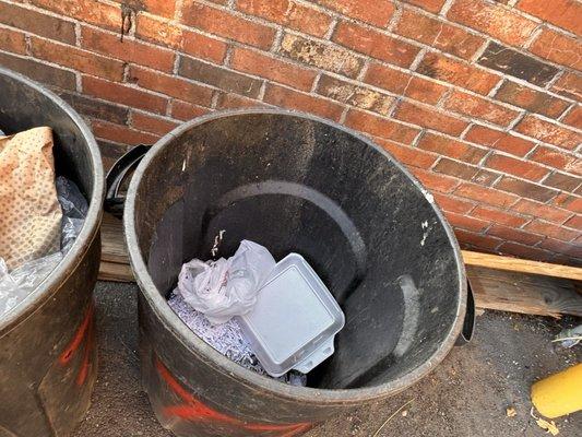 This business thinks it's OK to dispose of all their used car, parts, motor oil, and other debris in the dumpster of the house next-door