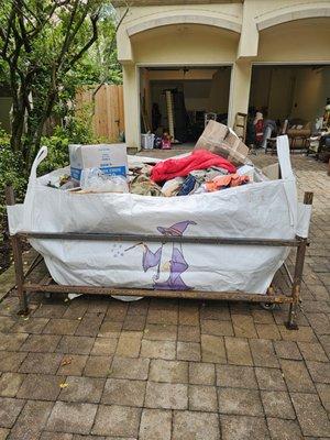 Our Junkle Bag holds as more than a pickup truck. We drop it off, you fill it up, then we come remove it when you are ready.