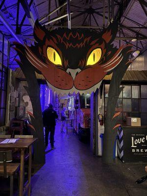 Cheshire Cat or the cat from Hausu