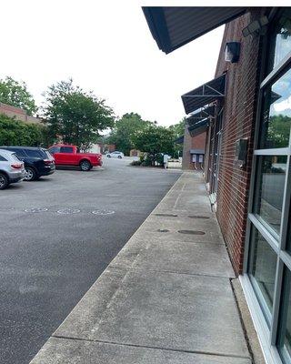 Lash Brow & Beauty is at the rear of the shopping center, you can't see it from the street. This is the view from the store to the street.