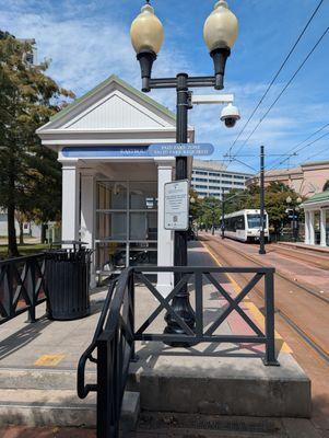 This is zoomed out view of the Eastbound Side. There are two seating areas to wait for the train. Photo taken September 23, 2025.