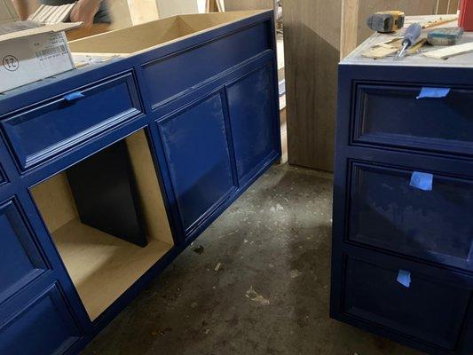Custom color is a Sherwin Williams marine blue.