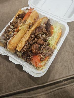 12" Cheesesteak sub on a seeded roll with everything, added lettuce and tomato.