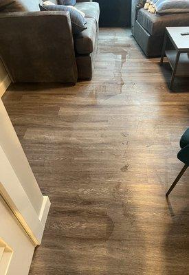 Window leak from rain reaching 10 feet. Also floor must be slanted bc water travels in a direction everytime.