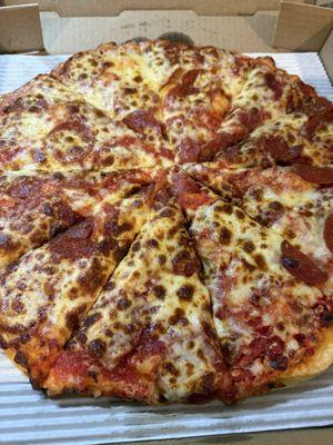 Dry no parm cold half raw pizza. I ordered this well done.