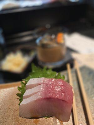 Yellowtail sashimi black tea old fashion