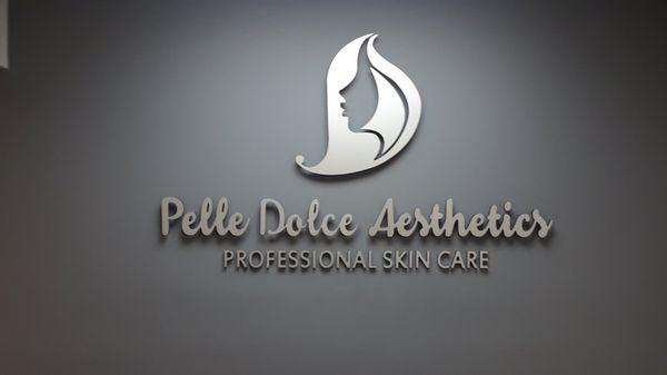 Dimensional lettering & logo on interior wall of office.