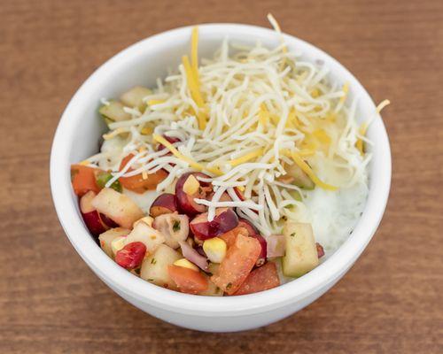 Black Bean Breakfast bowl - hearty black beans topped with an egg, seasonal salsa and shredded cheese.  Its delicious - trust me!