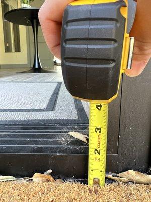2 inch tripping hazard across the front door