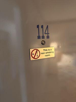 No smoking room that is heavily smoked in.