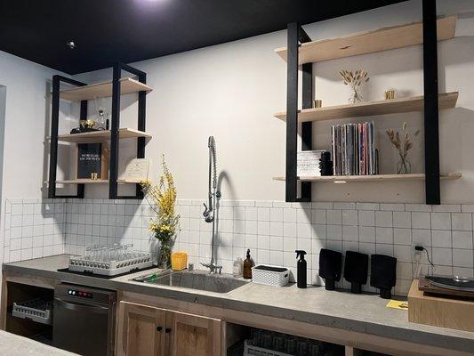 Behind the bar -- love the neutral tones & record player