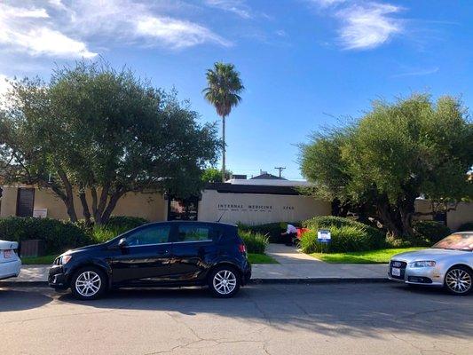 Main entrance. Parking lot around the side. Inside is significantly larger than it appears. Complete with Quest Diagnostics lab